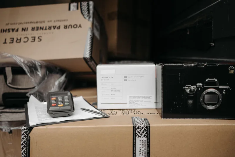 Assorted packages ready for shipment in an online seller’s workspace