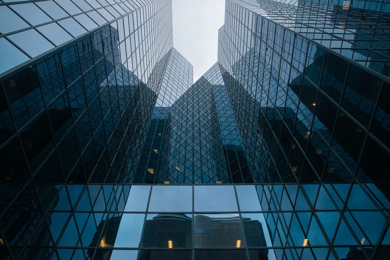 Modern glass office buildings representing Dubai free zone business districts