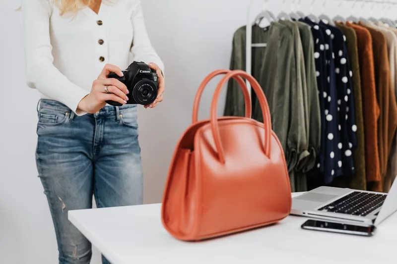Filipino online seller photographing a product for her first Lazada Philippines listing